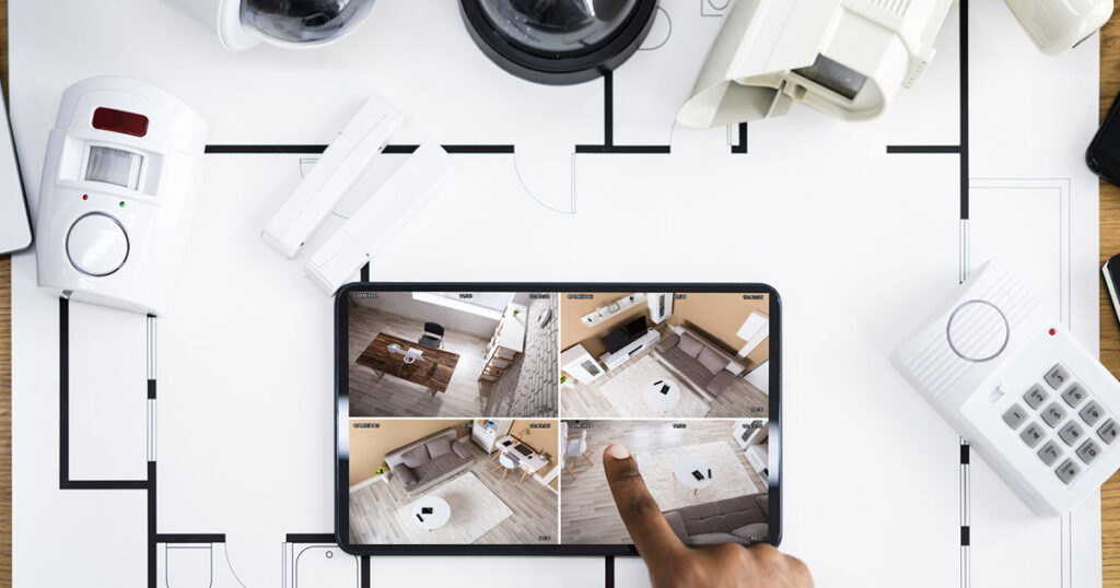 A flat lay of home alarm system essentials 