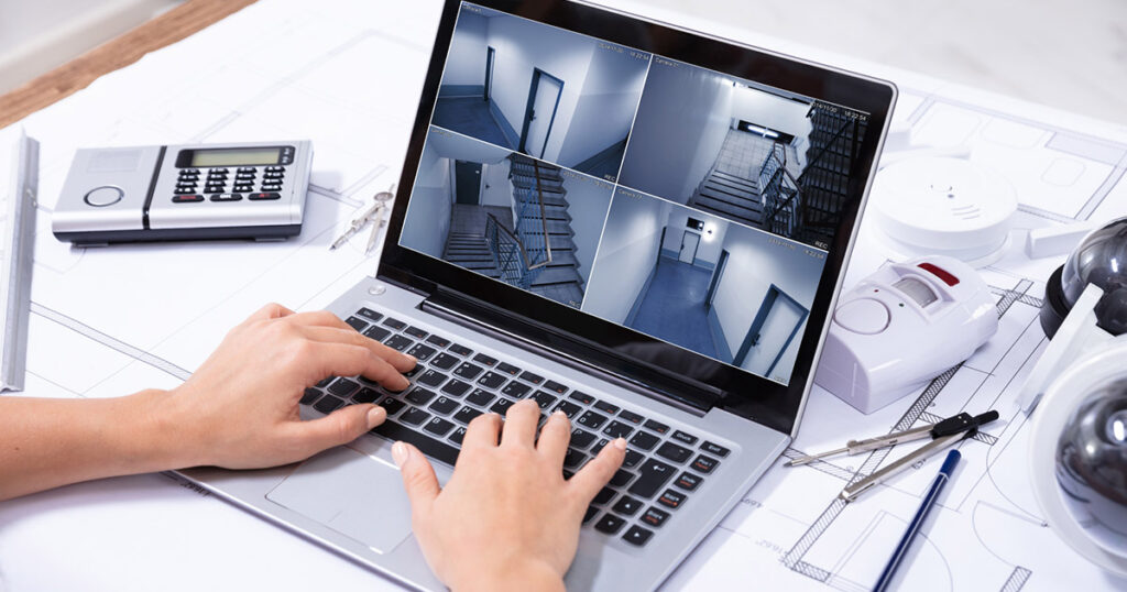 a business owner watches security footage